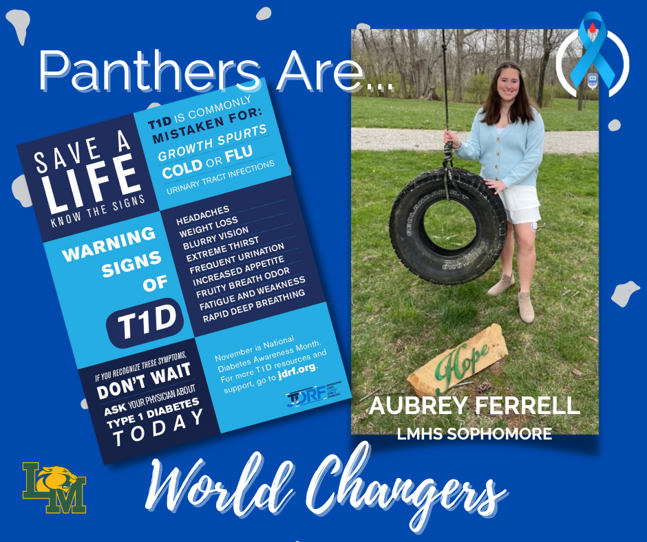 student holding a tire swing with the word